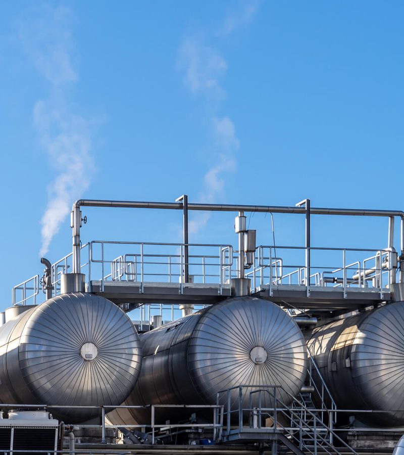 low-angle-view-industry-against-clear-blue-sky 1 (1)