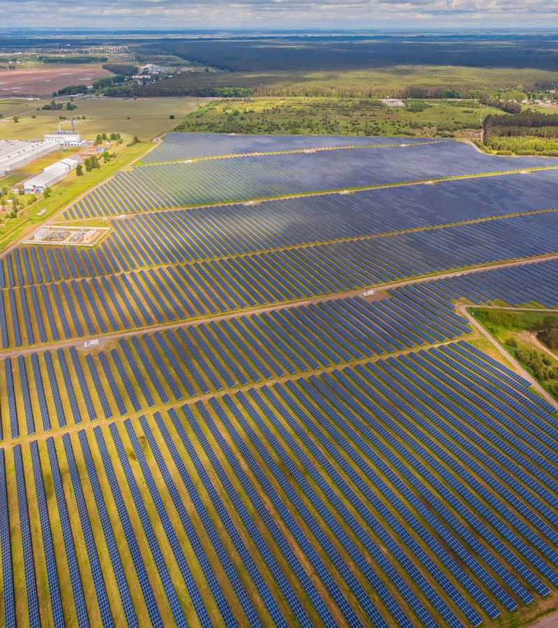 solar-power-plant-field-aerial-view-solar-panels 1 (1) solar-power-plant-field-aerial-view-solar-panels 1 (1)